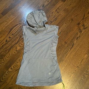 Light blue sleeveless top with hood.